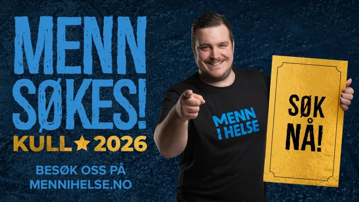 Promoplakat for Menn i helse-tilbudet for 2026. Mann smiler og peker mot fotografen. Holder en plakat som lyder "S&oslash;k n&aring;".